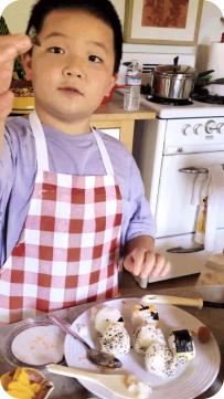Vertical-Boy-Cooking-Image